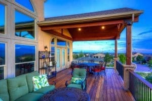 deck cover on a raised deck with outdoor furniture